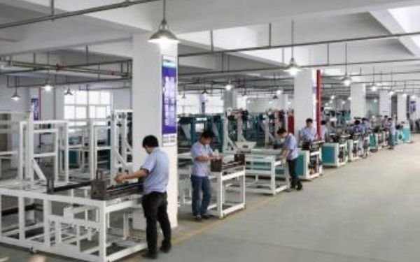 workers working on machinery supply company in china