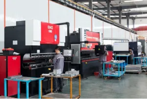 man standing infront of machine warehouse 